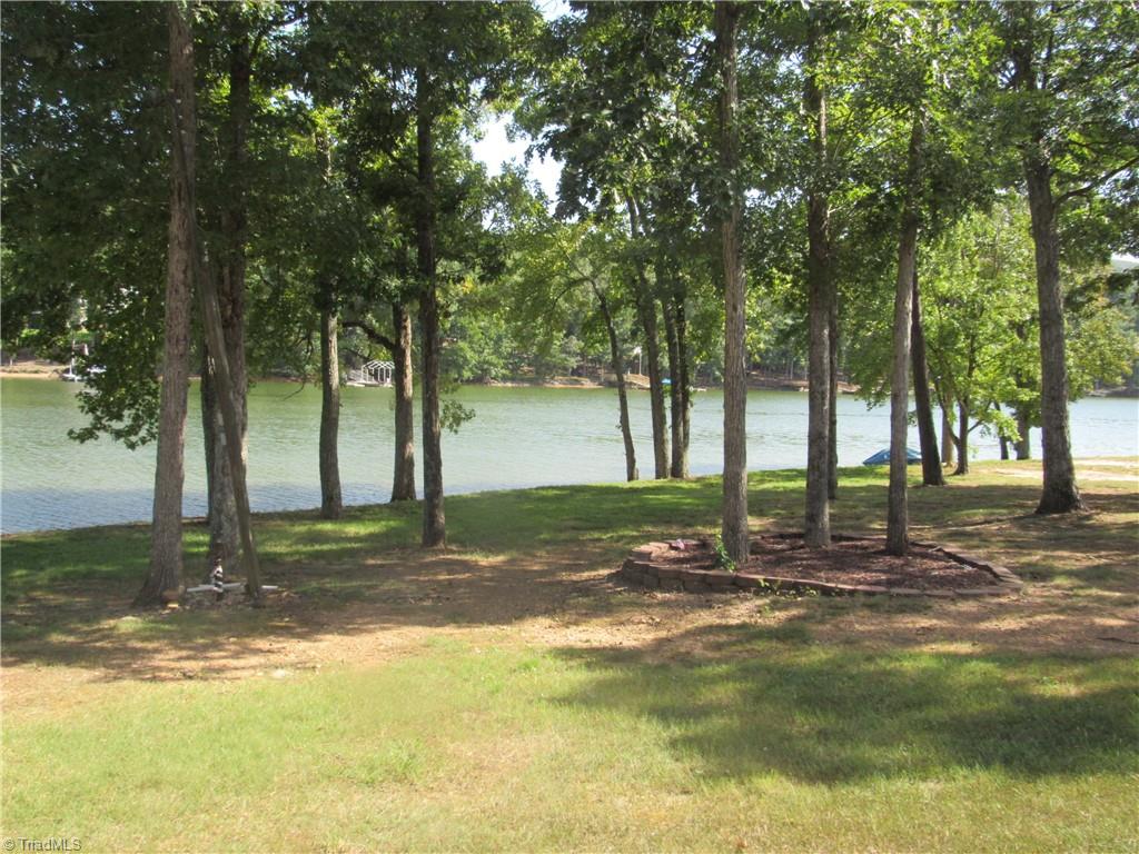 180 Roehm Landing Denton, NC 27239 - Photo 8 of 35 Directly beside the lot is the neighborhood beach area. You have the convenience of a beach but none of the upkeep.