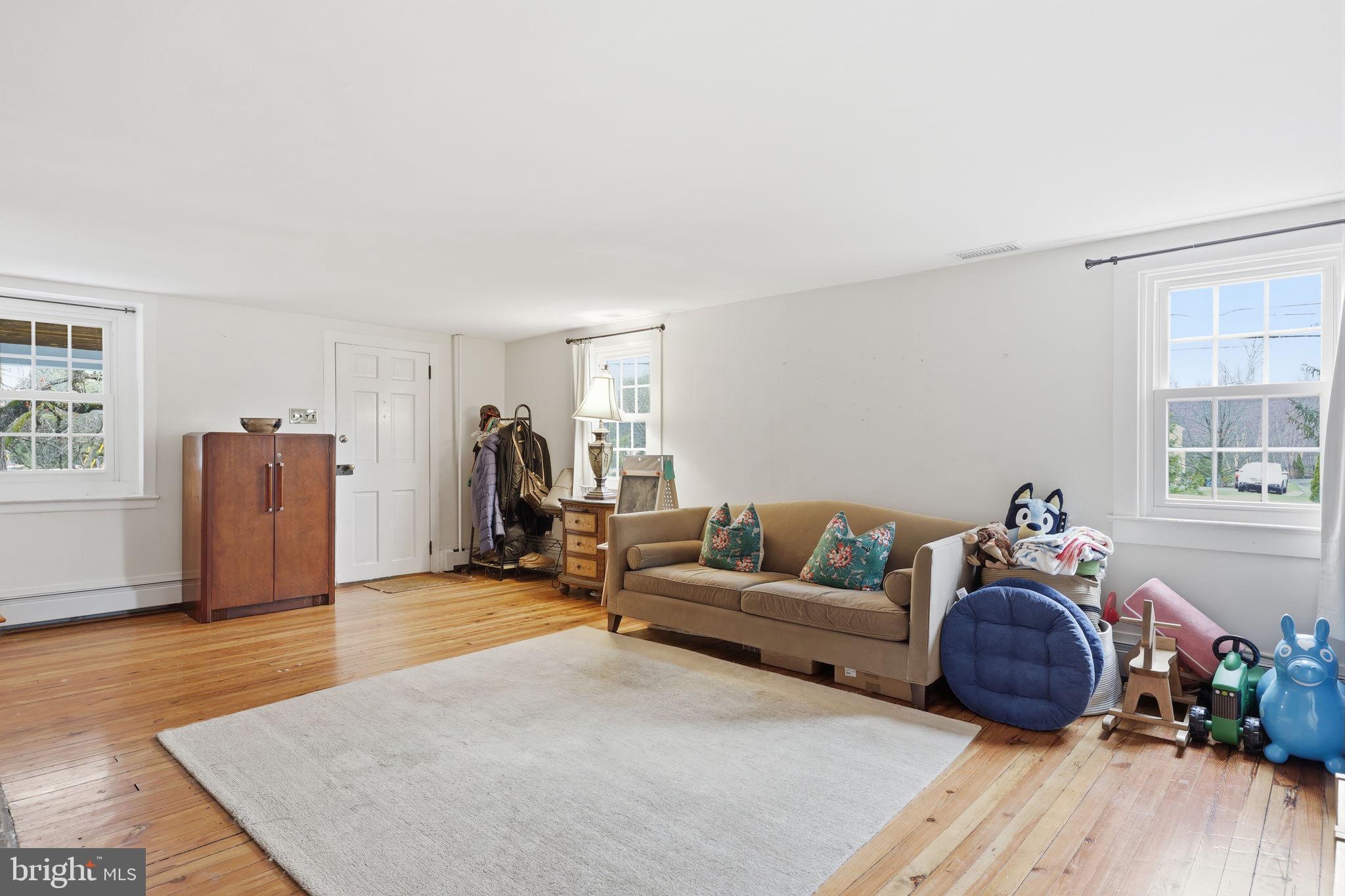 2293 Meetinghouse Road Jamison, PA 18929 - Photo 15 of 47 a living room with furniture and a wooden floor