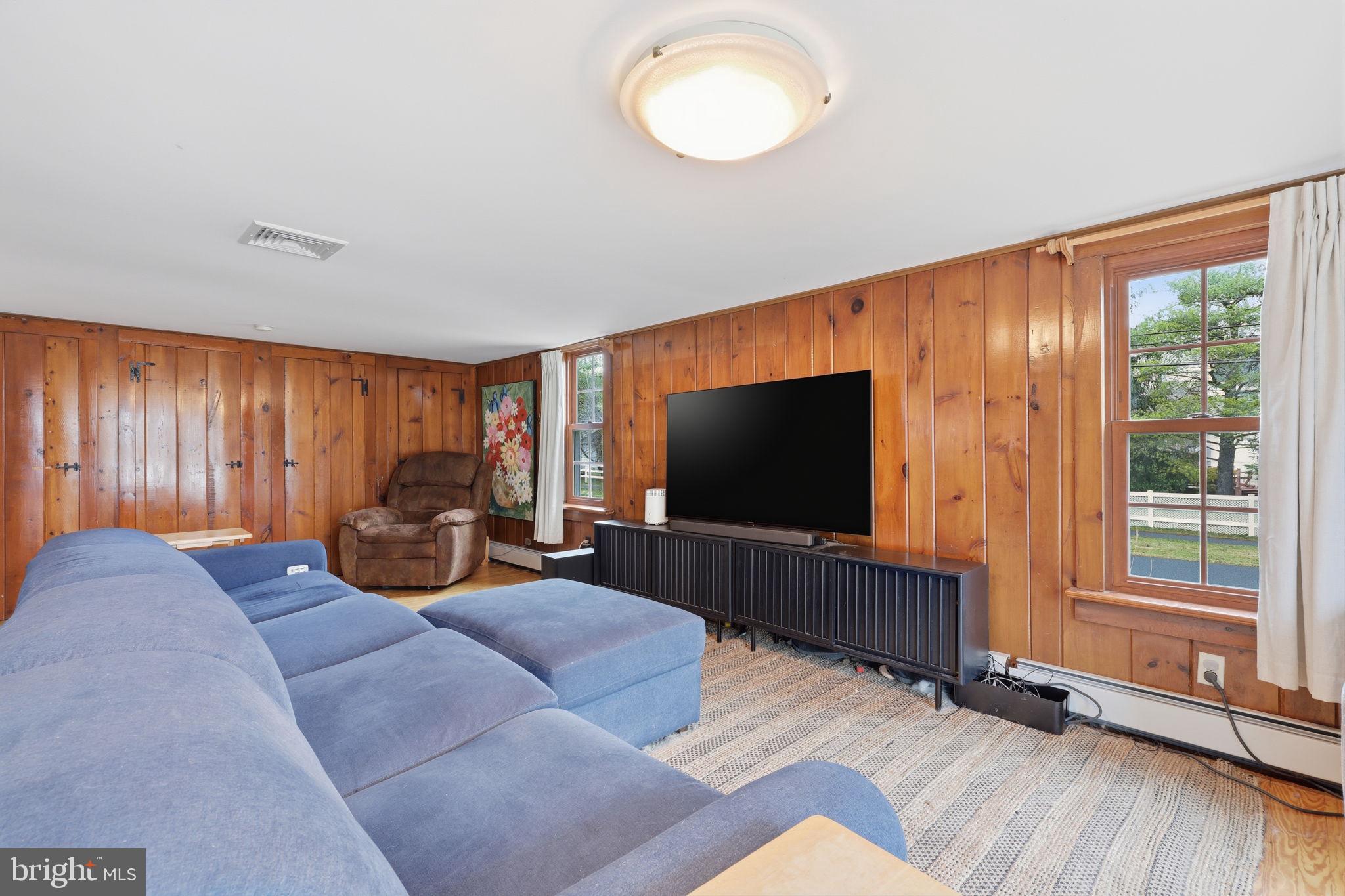 2293 Meetinghouse Road Jamison, PA 18929 - Photo 18 of 47 a bedroom with furniture and a flat screen tv