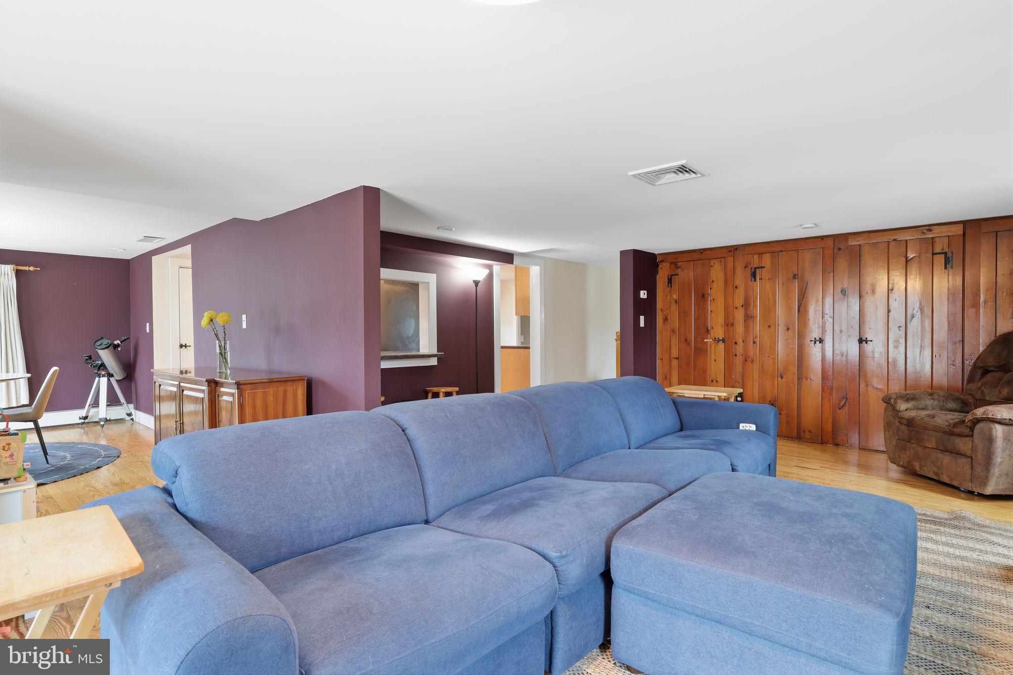 2293 Meetinghouse Road Jamison, PA 18929 - Photo 19 of 47 a living room with furniture a couch and wooden floor