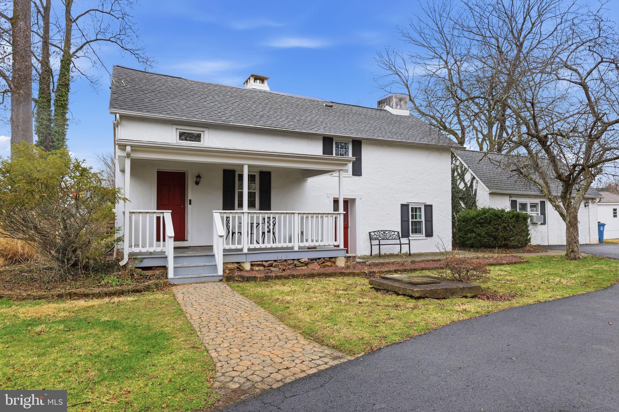 2293 Meetinghouse Road Jamison, PA 18929 - Photo 2 of 47 a view of a white house with a swimming pool and porch