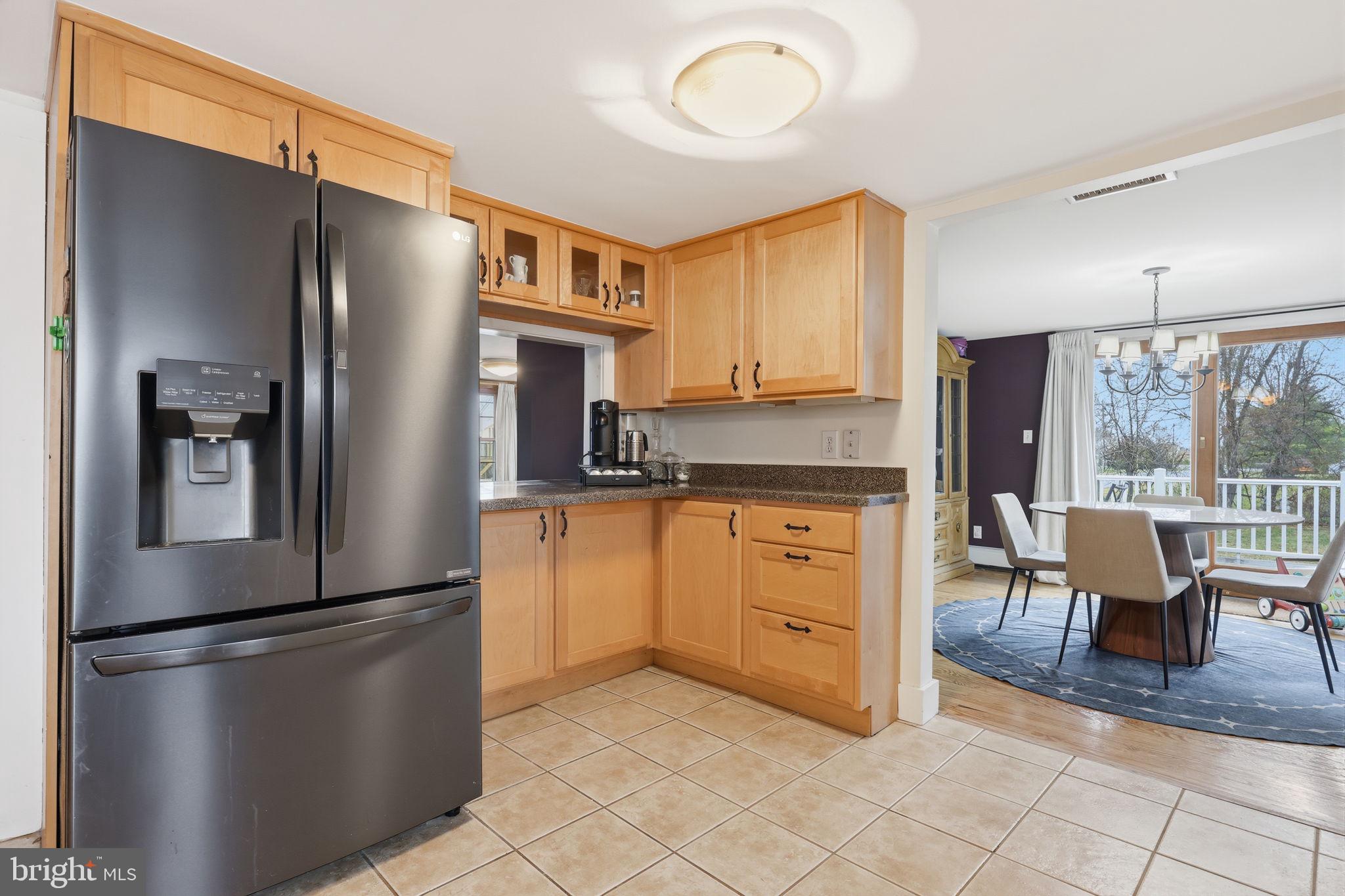 2293 Meetinghouse Road Jamison, PA 18929 - Photo 22 of 47 a kitchen with stainless steel appliances a refrigerator sink and cabinets