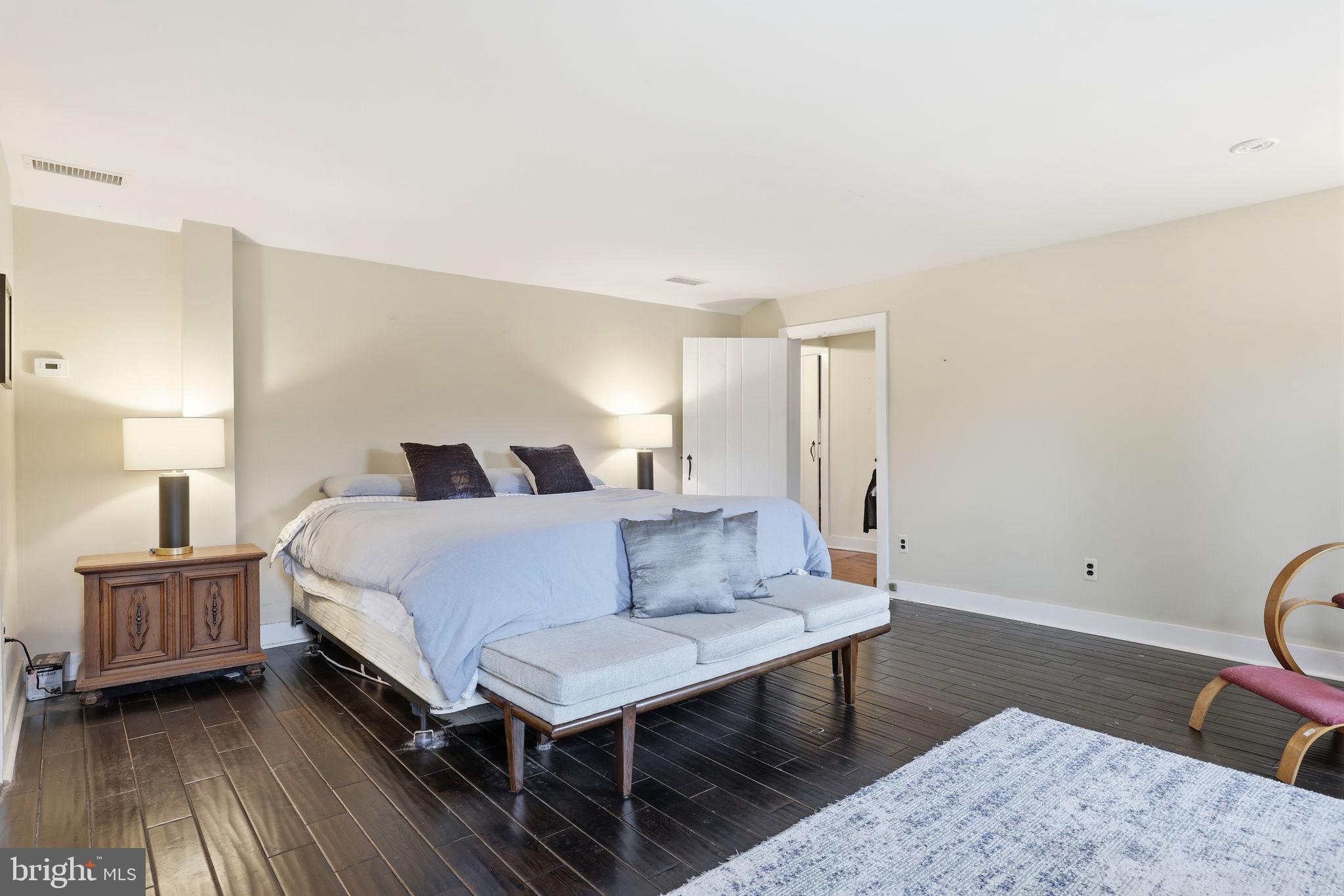 2293 Meetinghouse Road Jamison, PA 18929 - Photo 29 of 47 a bedroom with a bed and wooden floor