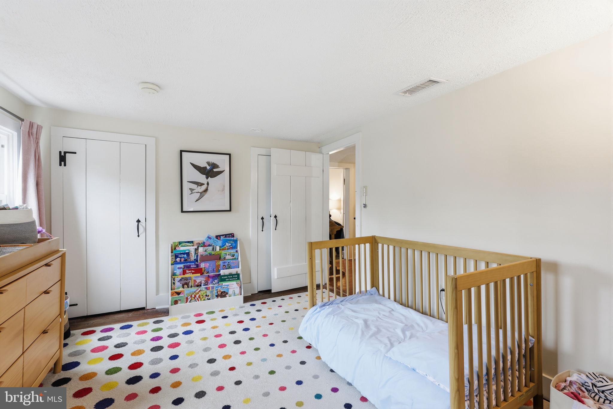 2293 Meetinghouse Road Jamison, PA 18929 - Photo 34 of 47 a bedroom with a bed and wooden floor