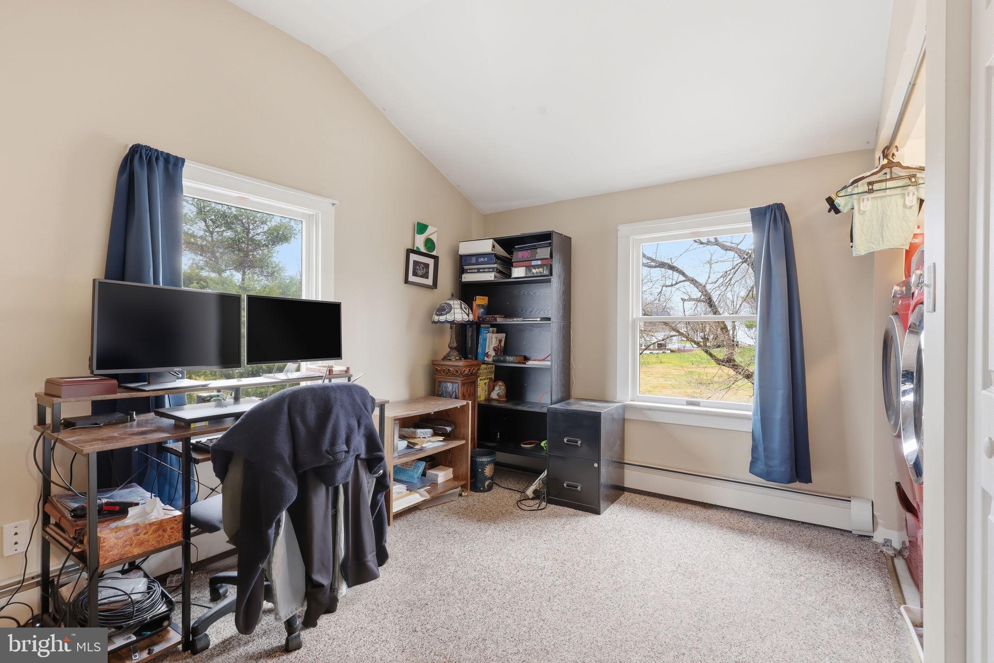 2293 Meetinghouse Road Jamison, PA 18929 - Photo 36 of 47 a view of a livingroom with workspace and a window