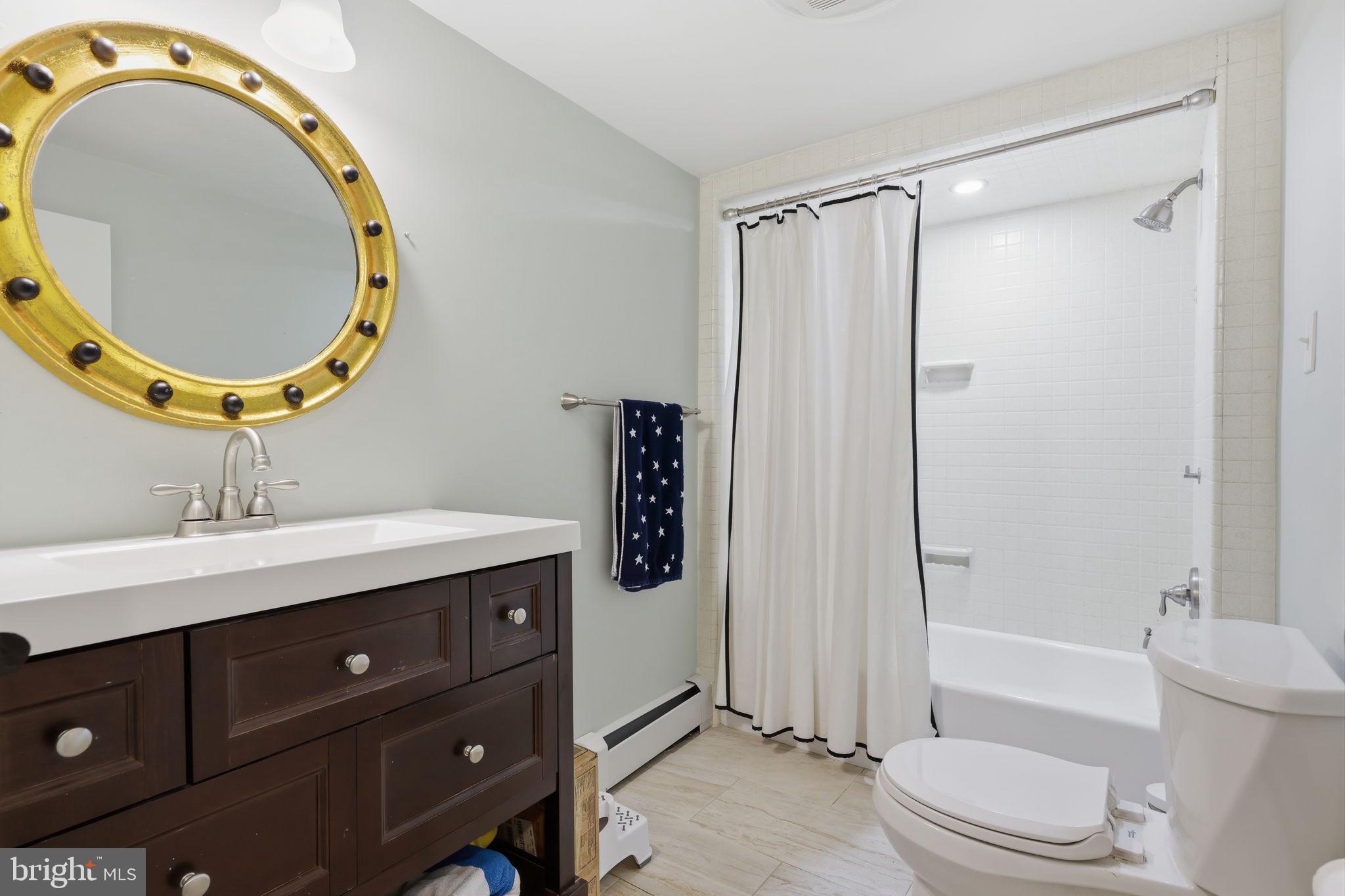 2293 Meetinghouse Road Jamison, PA 18929 - Photo 40 of 47 a bathroom with a sink a toilet and a mirror