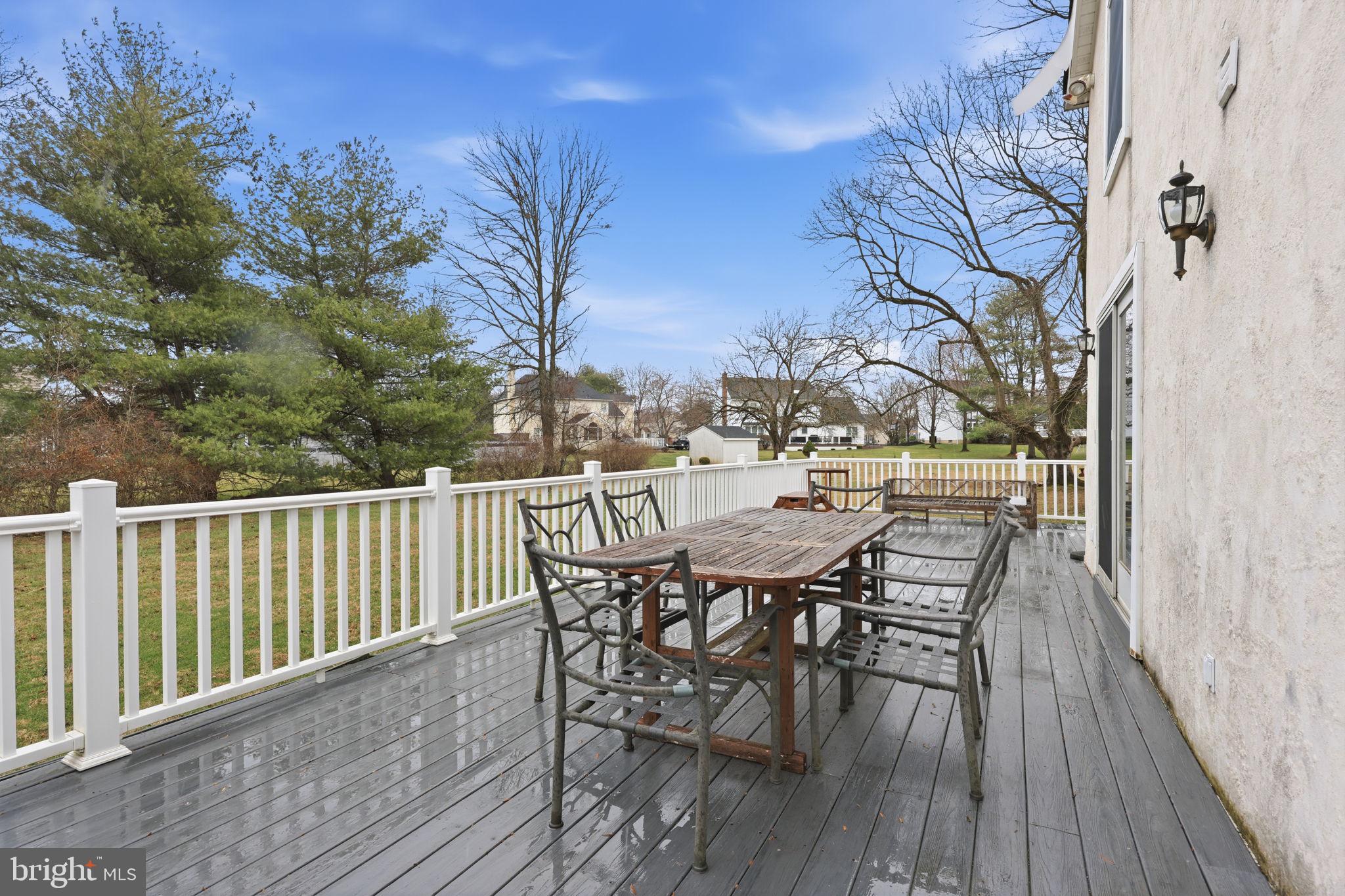 2293 Meetinghouse Road Jamison, PA 18929 - Photo 7 of 47 a view of a dinning table and chairs on roof deck