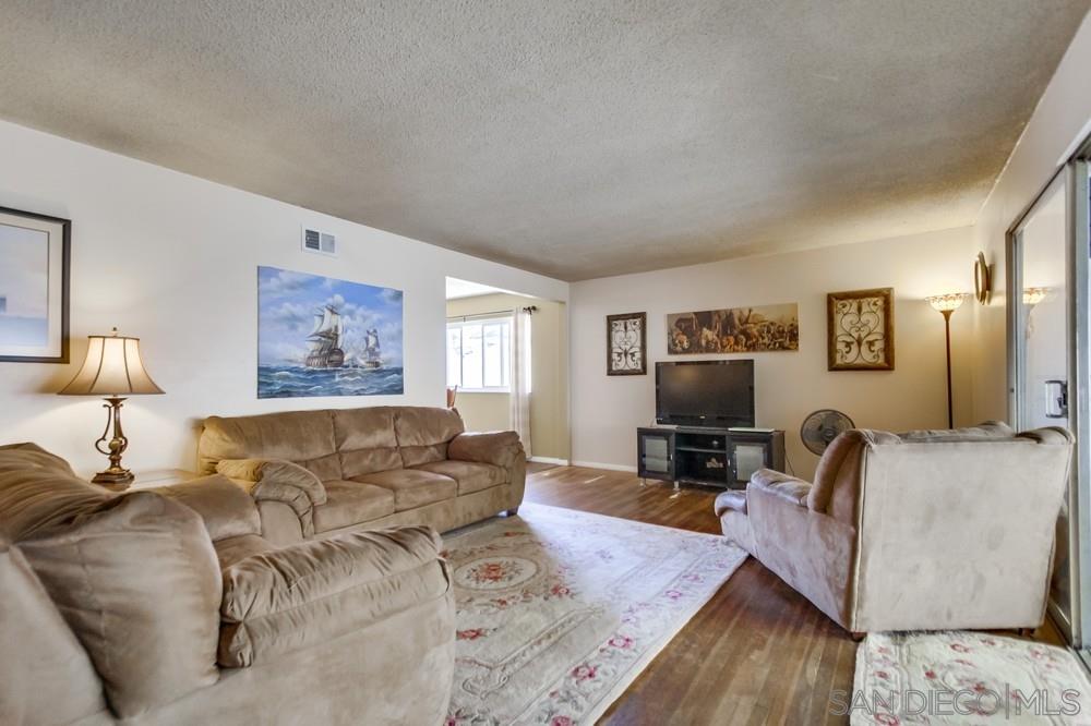 8103 Brampton Street Spring Valley, CA 91977 - Photo 3 of 21 Large Living and Family Room Combo