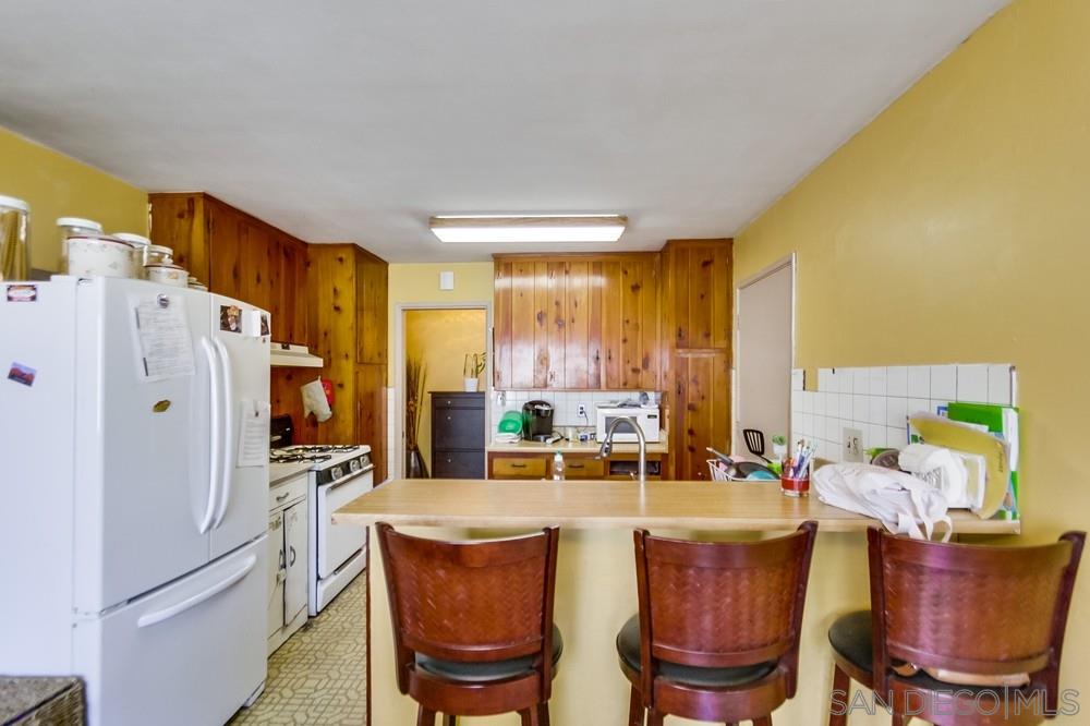 8103 Brampton Street Spring Valley, CA 91977 - Photo 8 of 21 Counter with stools as a breakfast nook