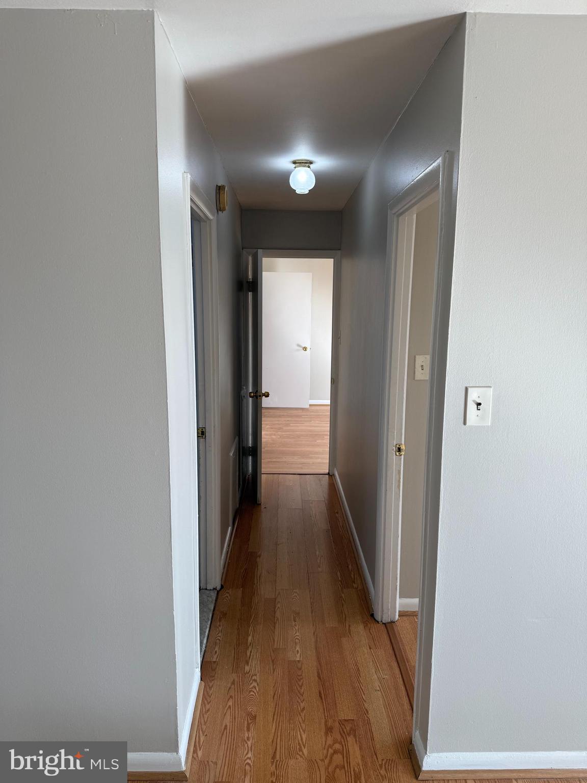 8830 Piney Branch Road Silver Spring, MD 20903 - Photo 8 of 15 a view of a hallway with wooden floor