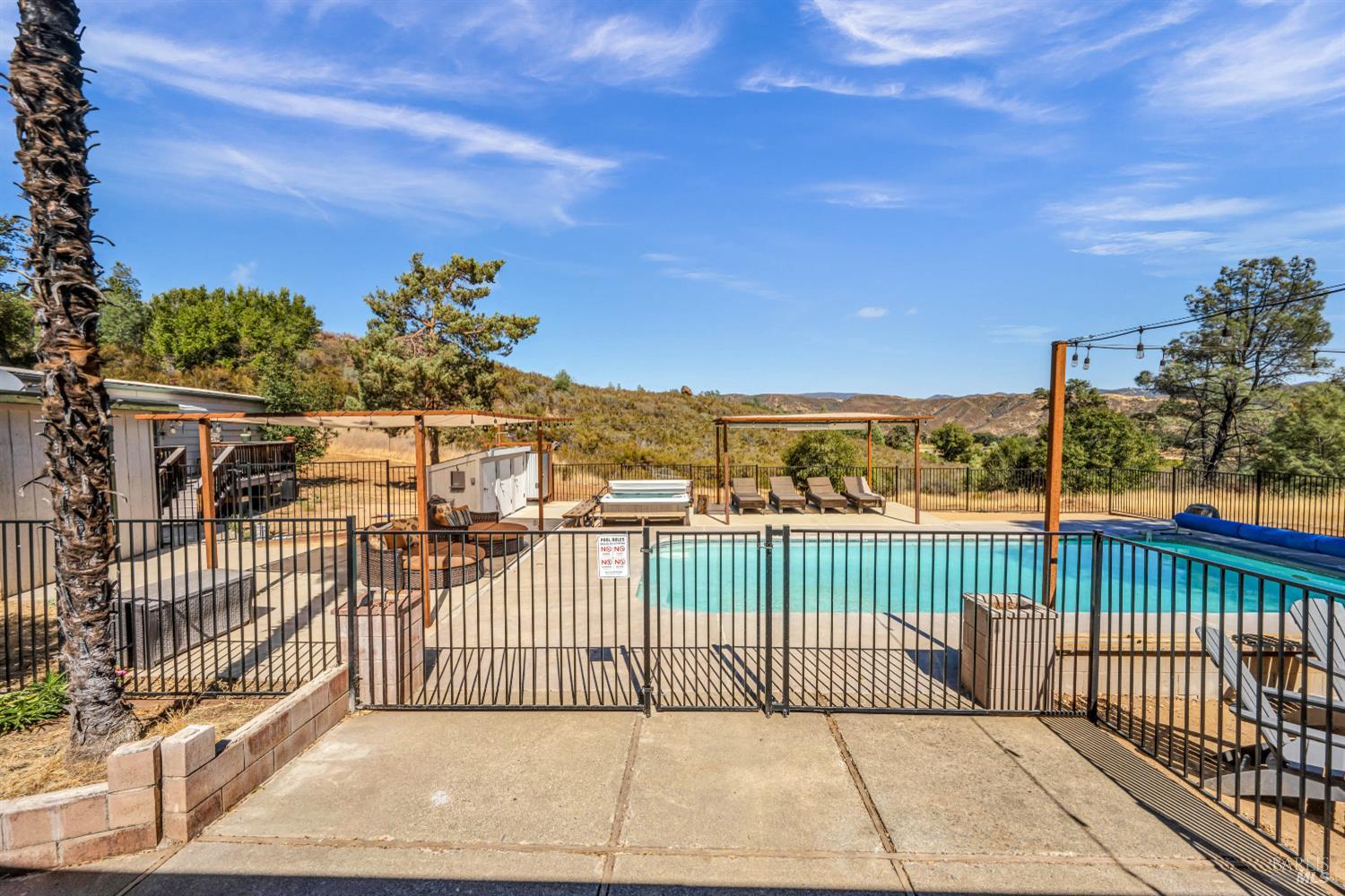 500 Old Long Valley Road Clearlake Oaks, CA 95423 - Photo 53 of 83 a view of a balcony with wooden fence