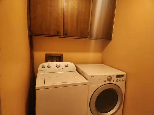 a utility room with dryer and washer