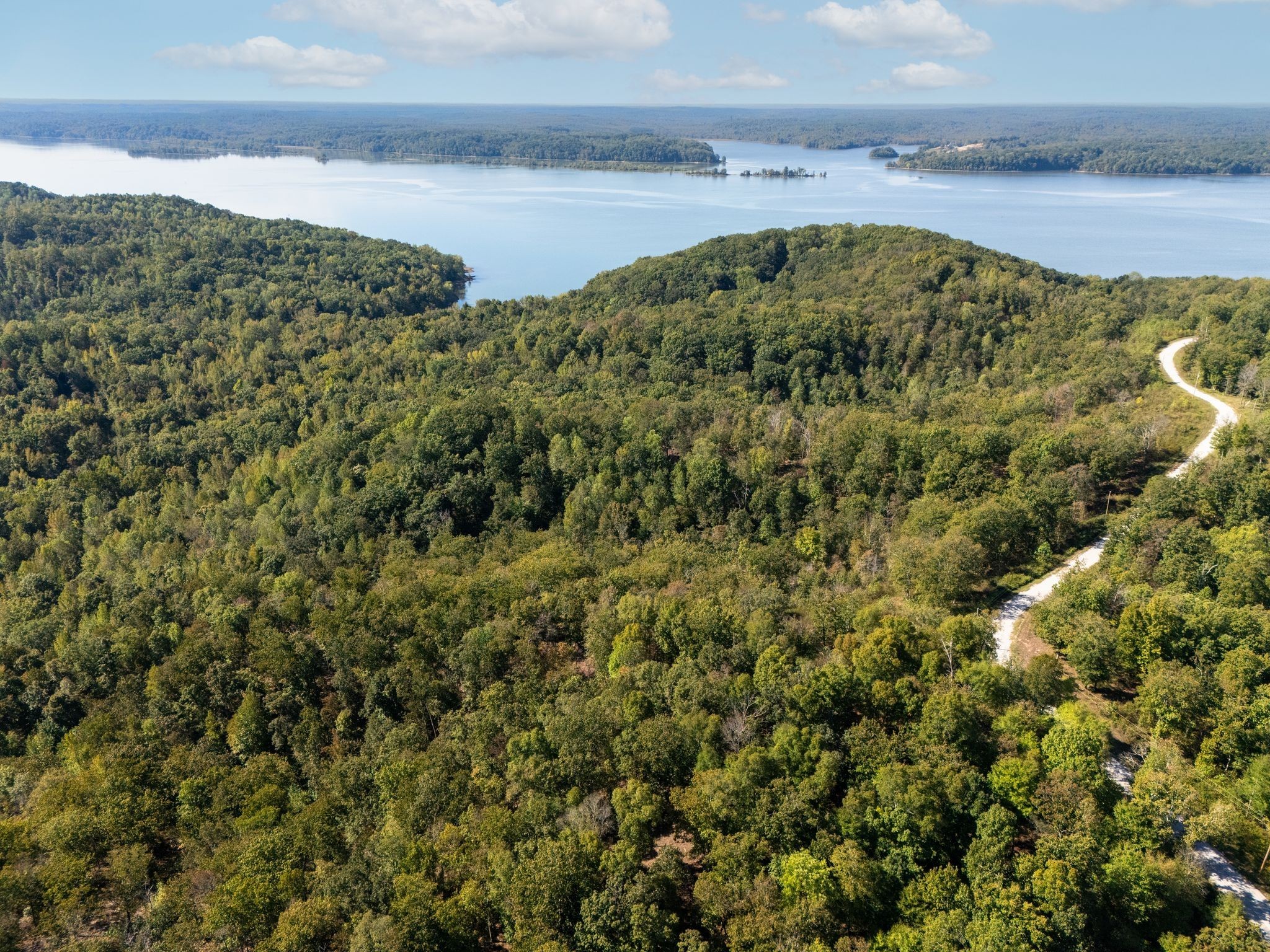 33 Vista Ridge Drive Stewart, TN 37175 - Photo 3 of 22 a view of a lake and mountain