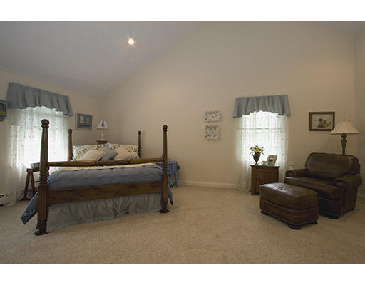 26 Tomahawk Road Arlington, MA 02474 - Photo 17 of 30 a living room with furniture a window and a flat screen tv