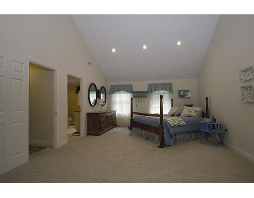 26 Tomahawk Road Arlington, MA 02474 - Photo 18 of 30 a living room with furniture and a table
