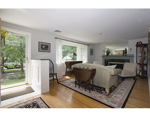 26 Tomahawk Road Arlington, MA 02474 - Photo 5 of 30 a living room with furniture and a fireplace