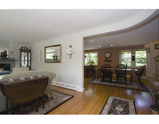 26 Tomahawk Road Arlington, MA 02474 - Photo 7 of 30 a living room with furniture and a wooden floor