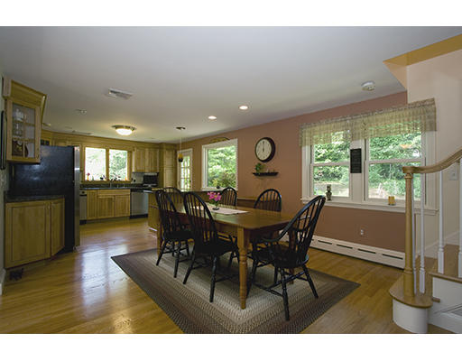 26 Tomahawk Road Arlington, MA 02474 - Photo 10 of 30 a view of a dining room with furniture window and wooden floor