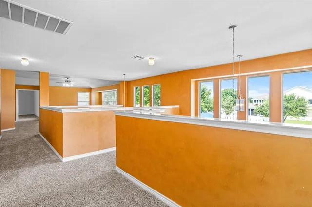 a view of an empty room with window