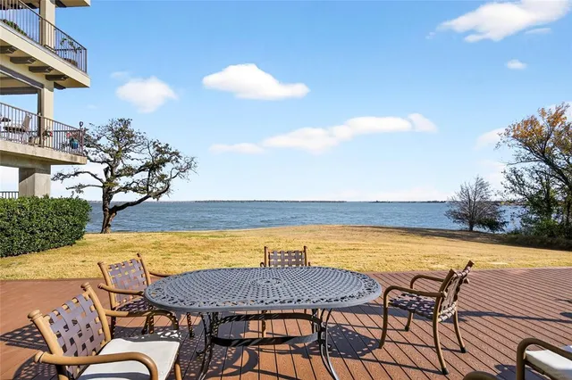 a view of a swimming pool and an outdoor seating