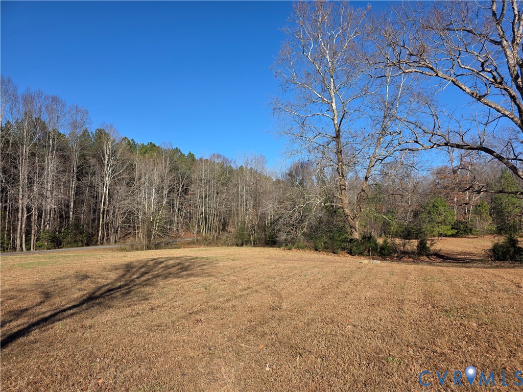 11782 Mt Landing Road Tappahannock, VA 22560 - Photo 14 of 15 a view of side of a road with a house in the background