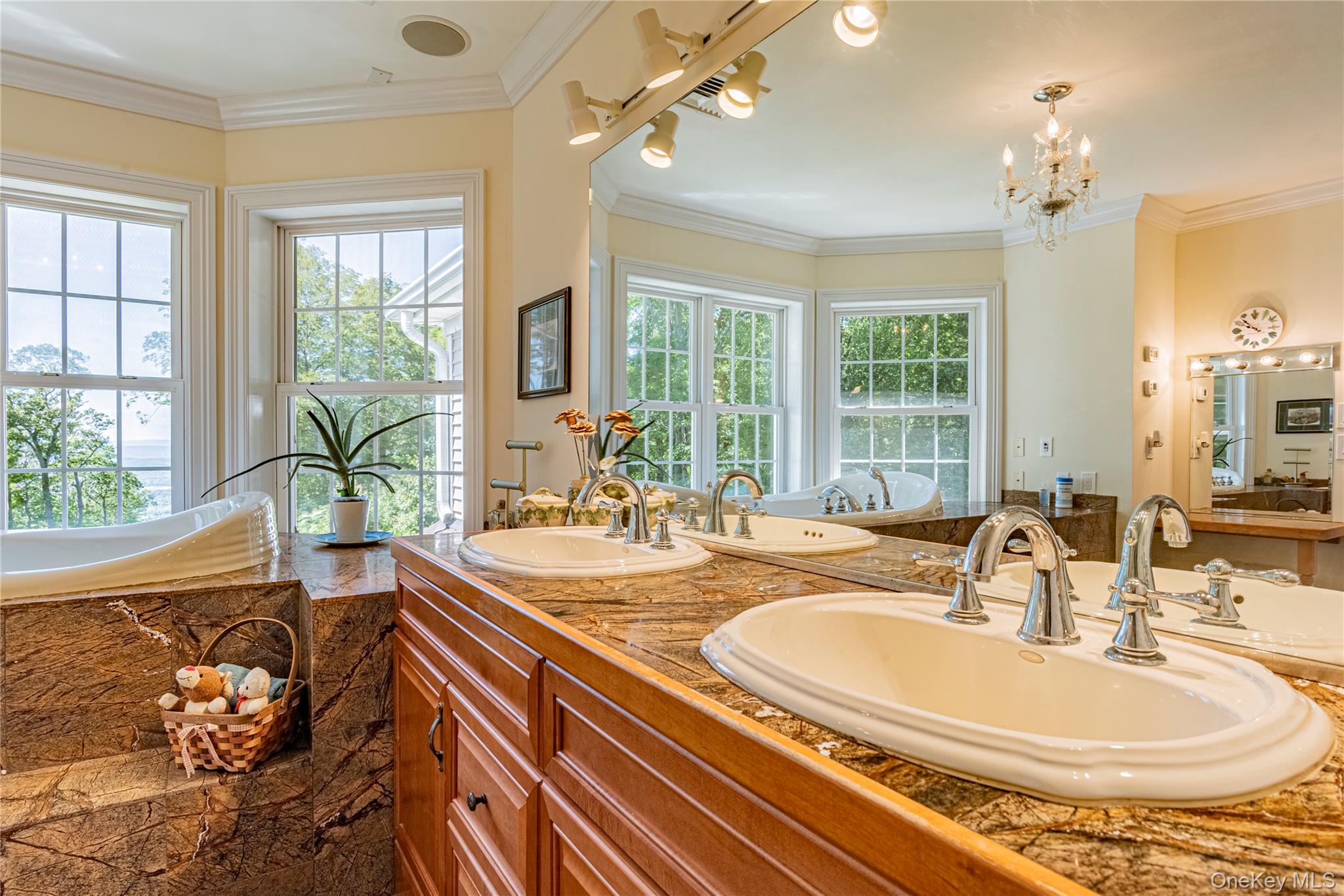 291 Woodmont Road Hopewell Junction, NY 12533 - Photo 29 of 49 a dining room with furniture and a chandelier