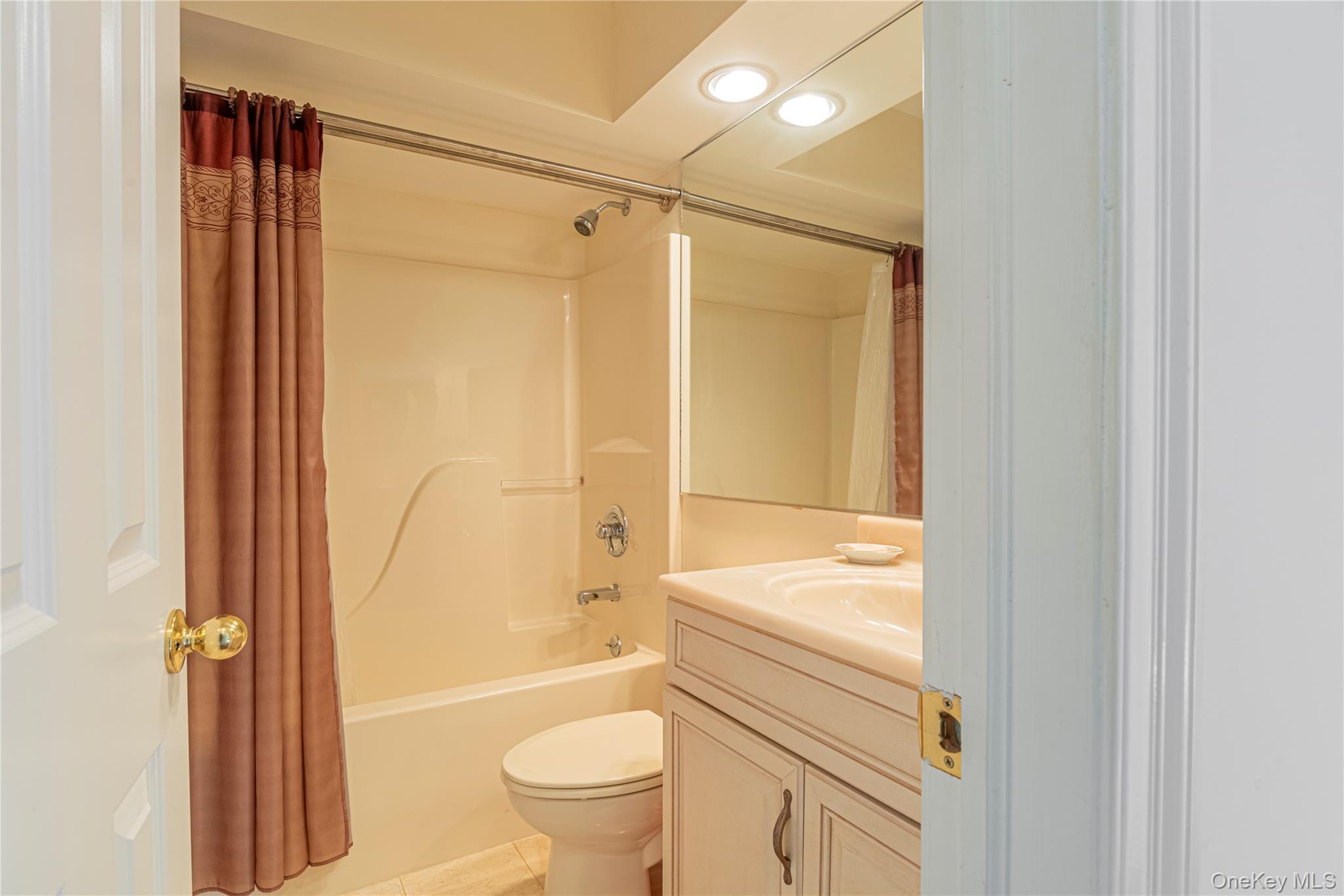 291 Woodmont Road Hopewell Junction, NY 12533 - Photo 33 of 49 a bathroom with a granite countertop bathtub shower sink vanity and toilet
