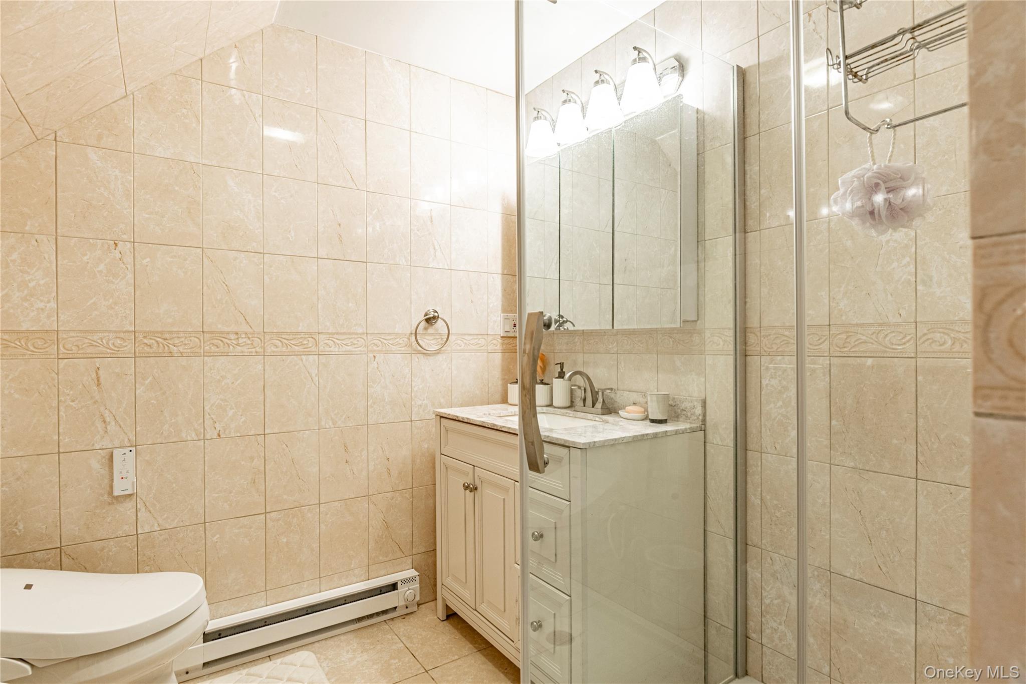 291 Woodmont Road Hopewell Junction, NY 12533 - Photo 36 of 49 a bathroom with a sink a toilet and shower