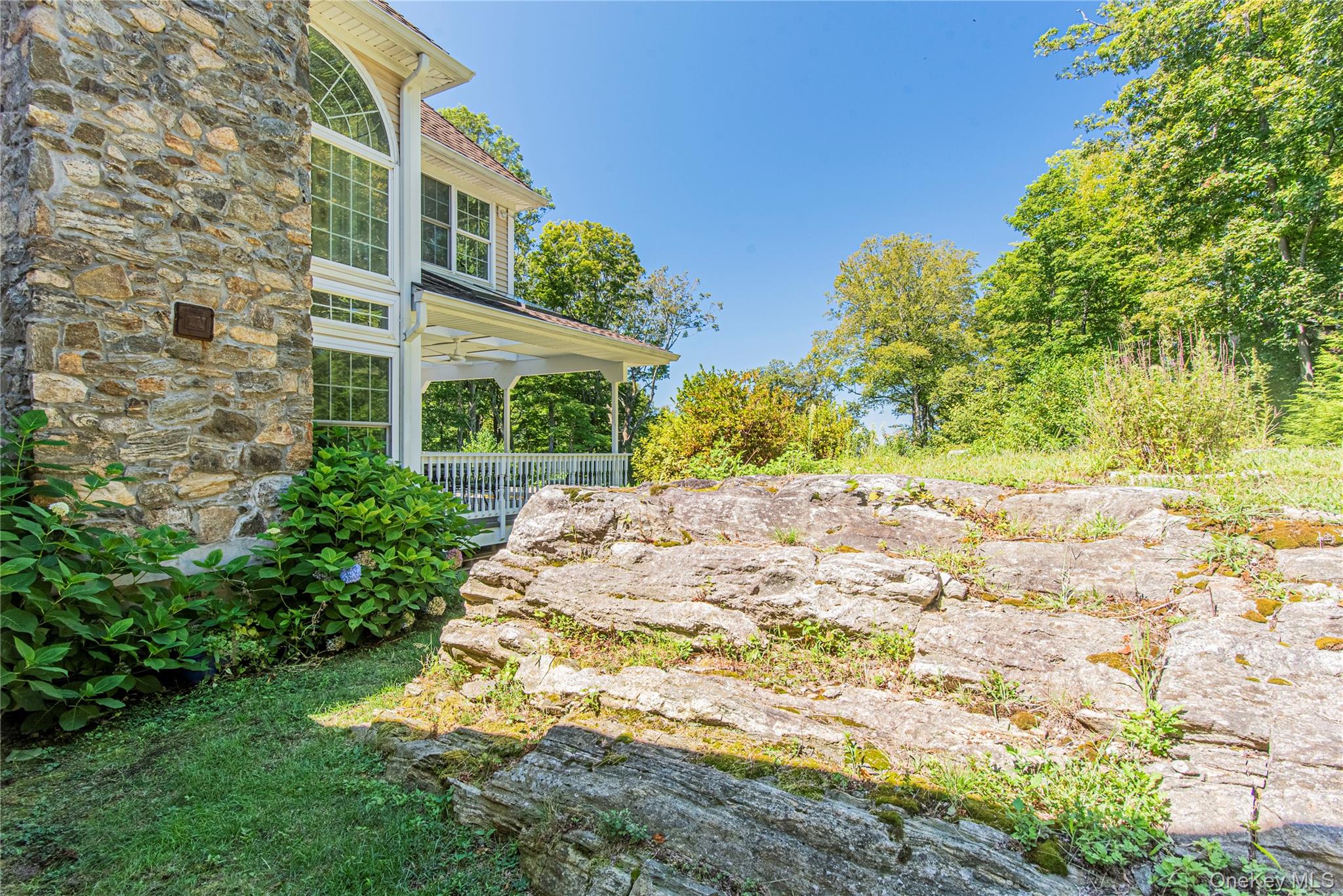 291 Woodmont Road Hopewell Junction, NY 12533 - Photo 10 of 49 a view of a house with a yard