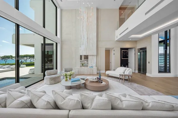 a large kitchen with stainless steel appliances a stove a sink dishwasher and a refrigerator