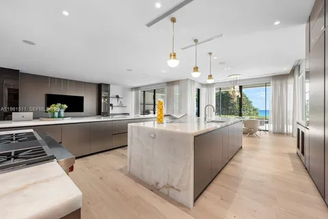 a view of living room with furniture and a large window