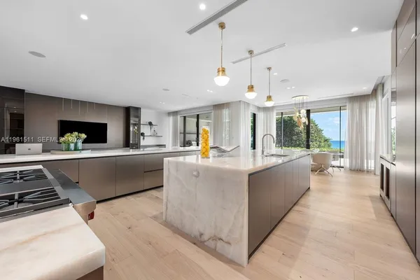a view of living room with furniture and a large window