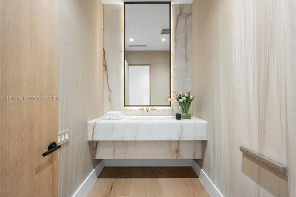 a view of swimming pool with seating space