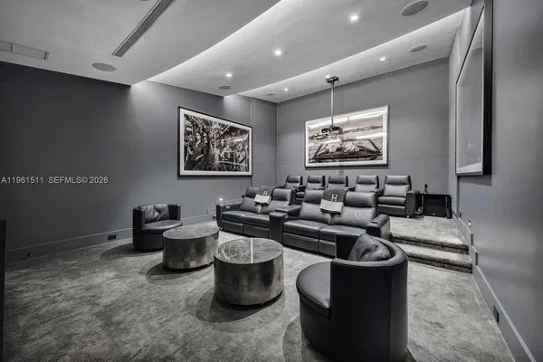 a view of an entryway with a floor to ceiling window