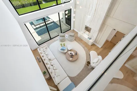 a bathroom with a double vanity sink toilet and shower