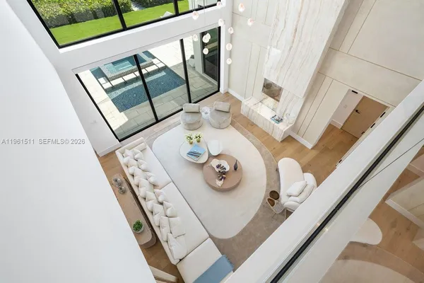 a bathroom with a double vanity sink toilet and shower