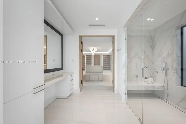 a view of an outdoor dining space with furniture and garden