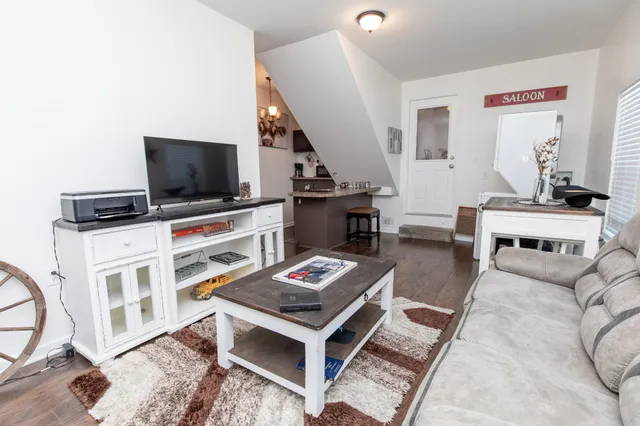 a bedroom with a bed and a cabinets