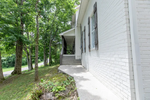 a view of a back yard of the house