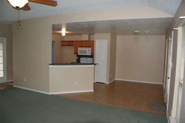 a view of a kitchen with a sink