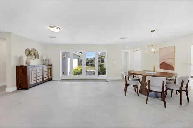a view of a livingroom with furniture window and wooden floor