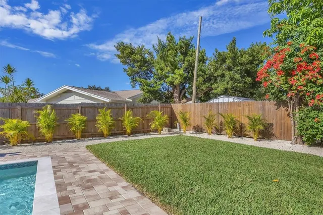 a house view with a garden space