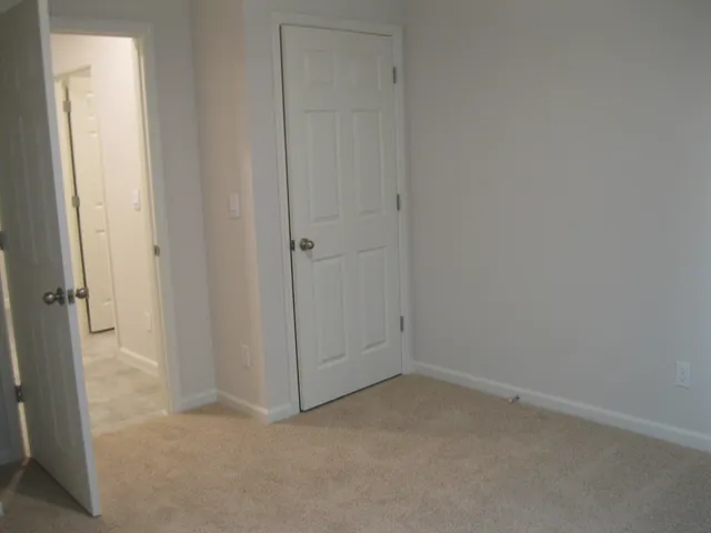 a view of bathroom with washer and dryer