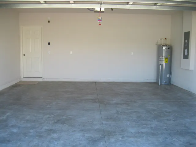 a view of a house with a small yard