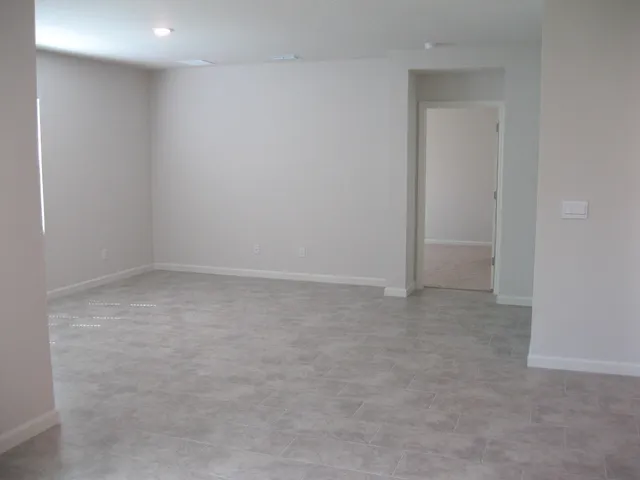 a kitchen with cabinets a sink and appliances