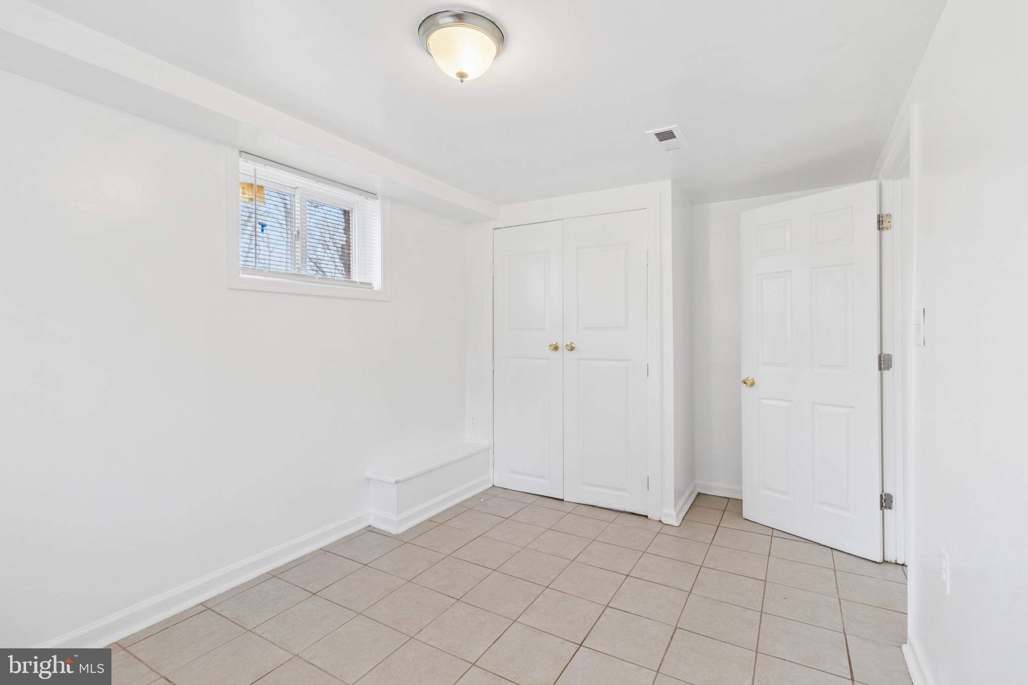407 Lebaum Street Southeast, Unit 4 Washington, DC 20032 - Photo 12 of 18 a view of an empty room