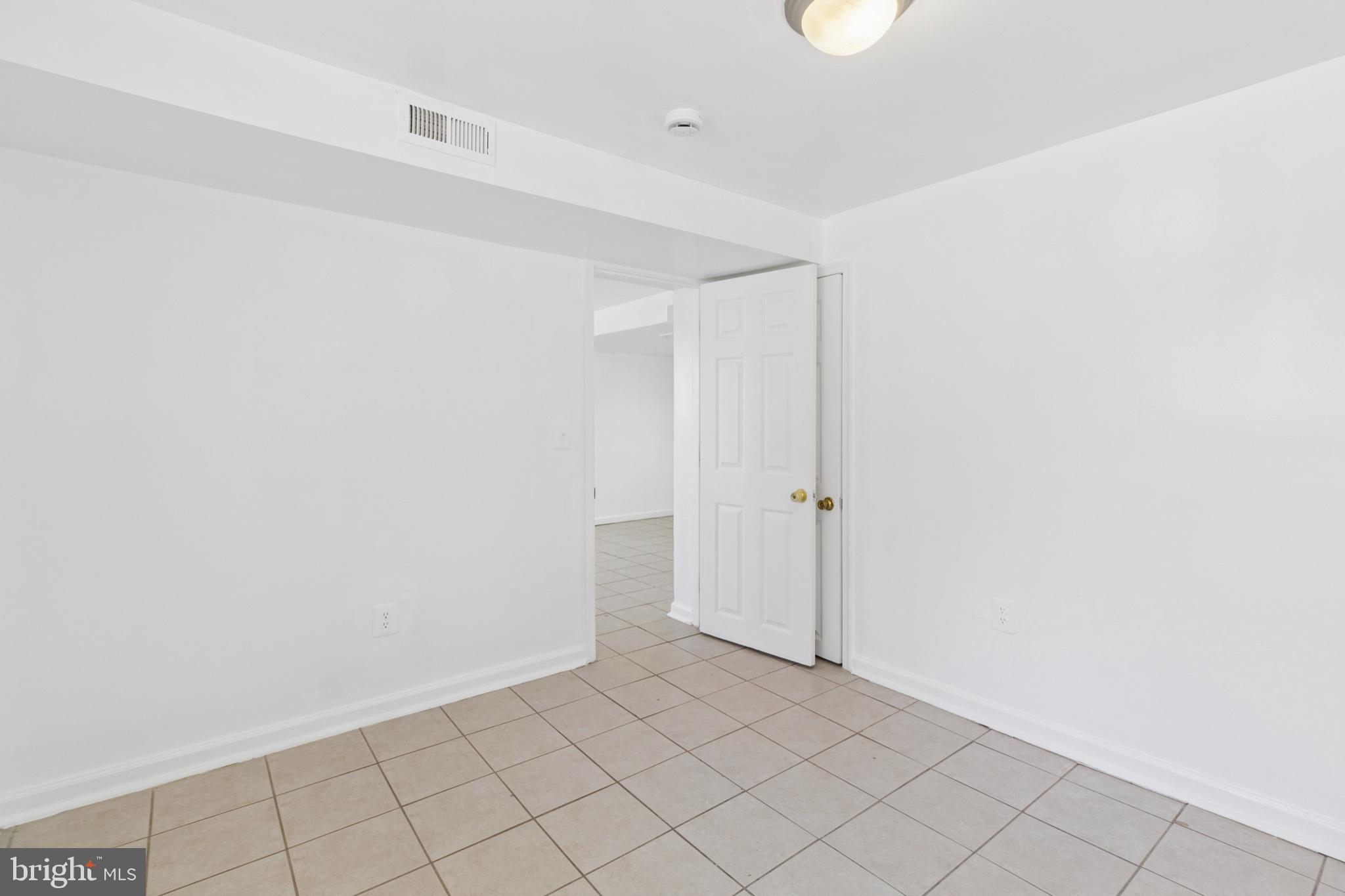407 Lebaum Street Southeast, Unit 4 Washington, DC 20032 - Photo 17 of 18 a view of an empty room