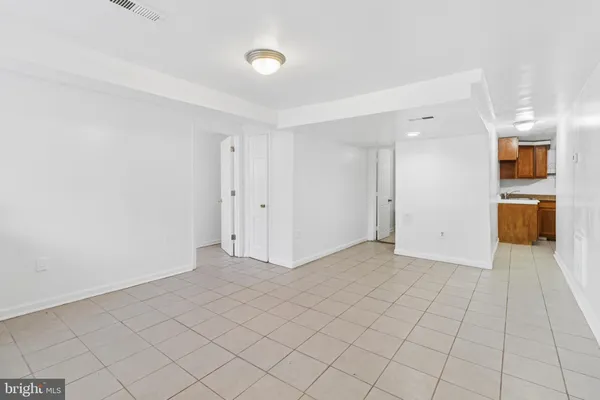 a view of an empty room and window