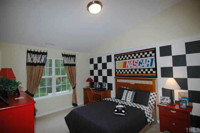 3147 Winding Waters Way Raleigh, NC 27614 - Photo 6 of 10 Large second bedroom with walk-in closet, vaulted ceiling and custom detailing. You'll love this one! Other