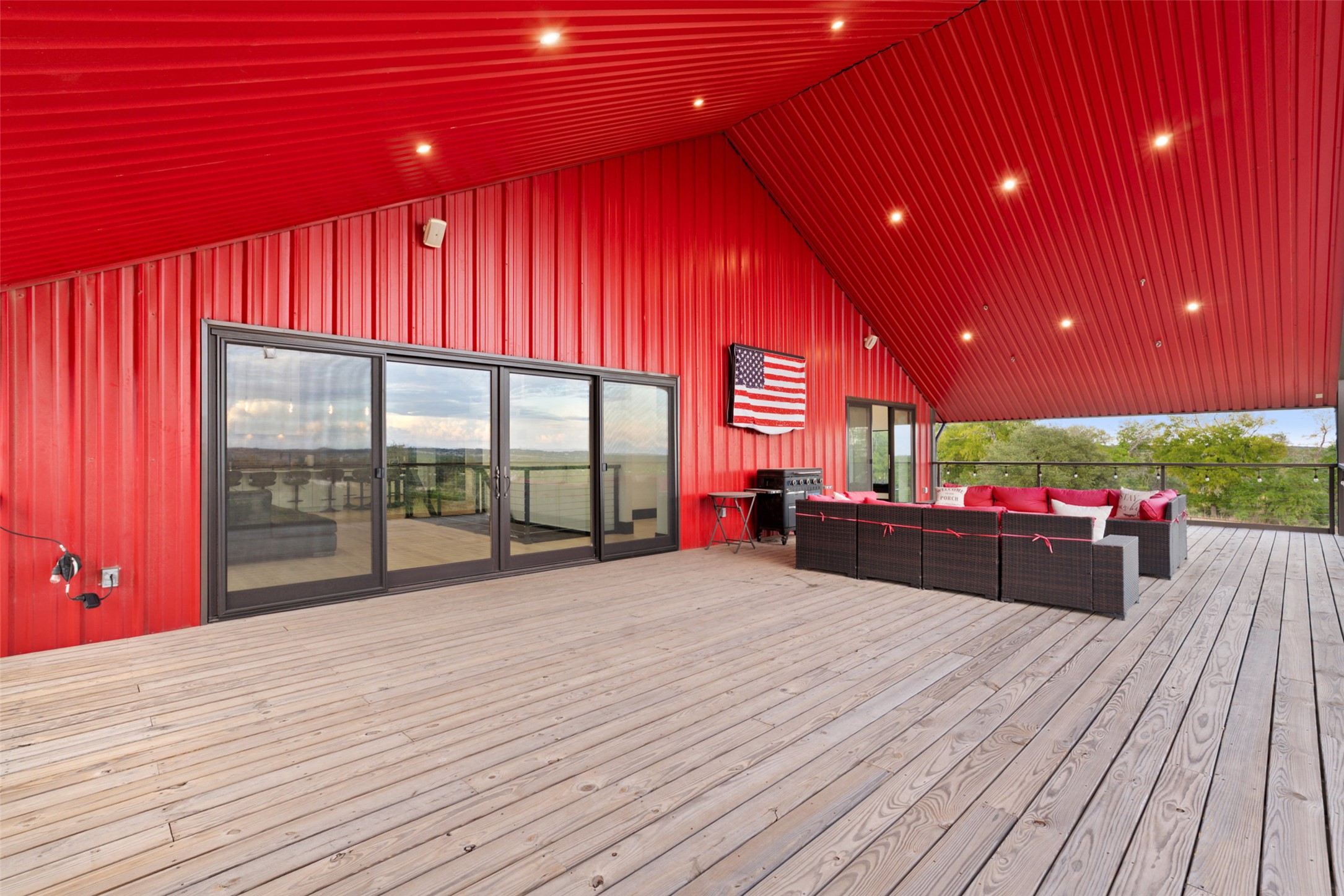 561 Broken Bit Trail Dripping Springs, TX 78620 - Photo 17 of 40 Deck featuring an outdoor living space and a grill